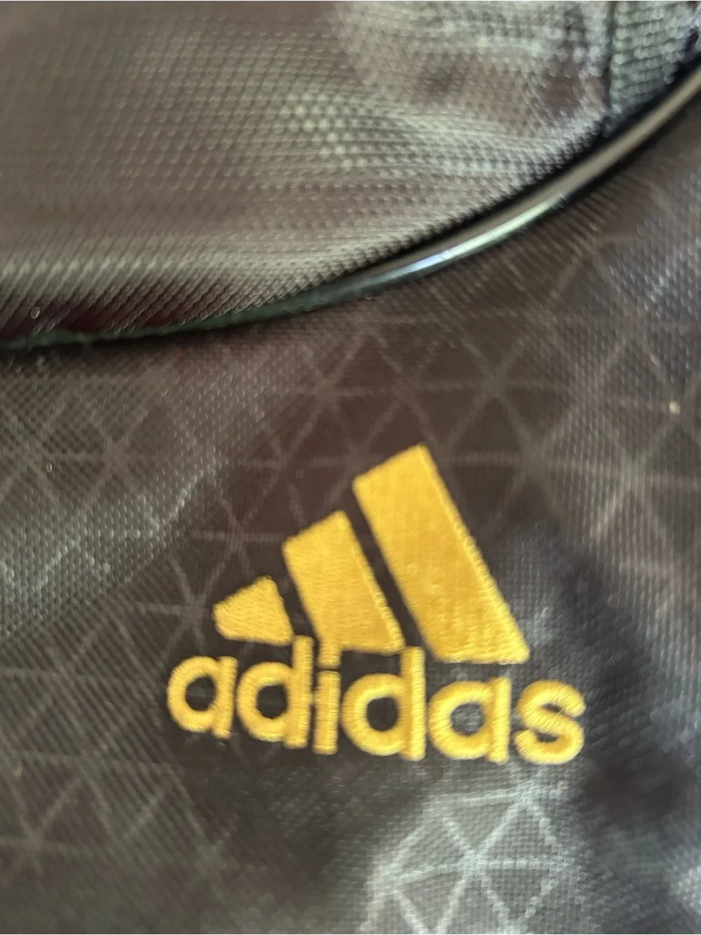 adidas Men’s Black Drawstring Backpack with Gold Stripes
